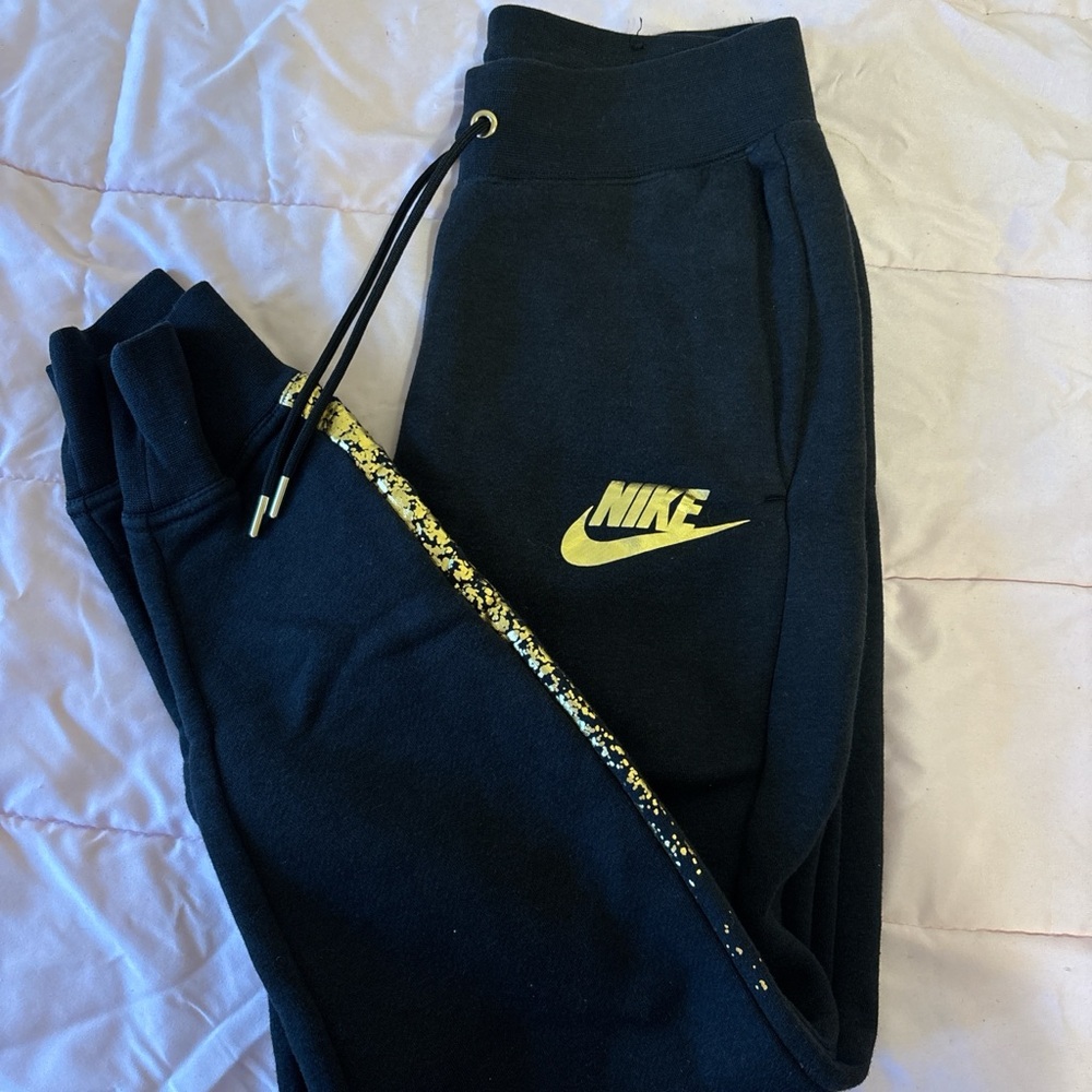 Nike Black Sweatpants with Gold Nike Logo and Speckled Drawcord